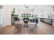 Open-concept living room boasts a stone fireplace, comfortable seating, and a seamless flow to the kitchen at 185 Paislee Park (Lot #10 Paislee Park) Dr, Fayetteville, GA 30215