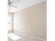 Bright bedroom featuring neutral walls, plush carpet, white trim, and natural light at 195 Finchley Dr, Roswell, GA 30076