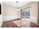 Dining room with hardwood floors and sliding glass doors to patio at 195 Finchley Dr, Roswell, GA 30076