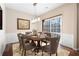 Dining room featuring a large table, seating for eight, and modern lighting at 195 Finchley Dr, Roswell, GA 30076