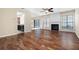 Spacious living room with hardwood floors, fireplace, and natural light at 195 Finchley Dr, Roswell, GA 30076