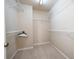 Walk-in closet with carpeted floor and wire shelving for maximum storage at 195 Finchley Dr, Roswell, GA 30076