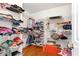 Spacious walk-in closet with extensive shelving and wooden floors at 3993 Amberley Ln, Marietta, GA 30062