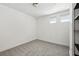 Bright bedroom with neutral carpet, white walls, and two windows with blinds allowing for natural light at 747 Ralph Mcgill Ne Blvd # 337, Atlanta, GA 30312