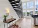 Hallway with modern decor, and staircase leading to upper level, and view of the apartment at 747 Ralph Mcgill Ne Blvd # 337, Atlanta, GA 30312