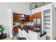 Contemporary kitchen with stainless steel appliances, eat-in bar, modern lighting, and open shelving at 747 Ralph Mcgill Ne Blvd # 337, Atlanta, GA 30312