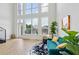 Sun-filled living room featuring a modern design, high ceilings and big windows with lovely outside view at 747 Ralph Mcgill Ne Blvd # 337, Atlanta, GA 30312