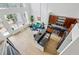 Open-concept living space with hardwood floors, large windows, and a modern kitchen featuring dark countertops at 747 Ralph Mcgill Ne Blvd # 337, Atlanta, GA 30312