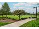 Picturesque park view with expansive green space, trees, sidewalk, and distant city skyline at 747 Ralph Mcgill Ne Blvd # 337, Atlanta, GA 30312