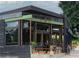 The exterior of a charming local restaurant featuring large windows and outdoor seating at 747 Ralph Mcgill Ne Blvd # 337, Atlanta, GA 30312