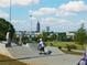 Active skate park with ramps, visible city skyline, and recreational area for outdoor activities at 747 Ralph Mcgill Ne Blvd # 337, Atlanta, GA 30312
