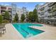 Beautiful outdoor swimming pool surrounded by lounge chairs and landscaping in a modern apartment complex at 747 Ralph Mcgill Ne Blvd # 337, Atlanta, GA 30312