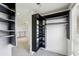 Bright walk-in closet with custom shelving and hanging rods offers ample storage space at 747 Ralph Mcgill Ne Blvd # 337, Atlanta, GA 30312