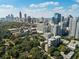 Scenic aerial view of the city skyline and trees at 1130 Piedmont Ne Ave # 907, Atlanta, GA 30309