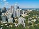 Aerial view of the city skyline among the trees at 1130 Piedmont Ne Ave # 907, Atlanta, GA 30309