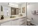 Bright bathroom featuring a large mirror, modern vanity, and updated fixtures at 1130 Piedmont Ne Ave # 907, Atlanta, GA 30309