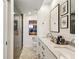 This bathroom features a double sink vanity and a glass-enclosed walk-in shower at 1130 Piedmont Ne Ave # 907, Atlanta, GA 30309
