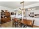 Dining area featuring hardwood floors, modern decor, and a view of the kitchen at 1130 Piedmont Ne Ave # 907, Atlanta, GA 30309