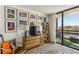 Inviting living room with modern decor, balcony access, and ample natural light at 1130 Piedmont Ne Ave # 907, Atlanta, GA 30309