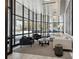Welcoming lobby with modern furnishings, floor to ceiling windows, and bright natural light at 1130 Piedmont Ne Ave # 907, Atlanta, GA 30309