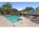 Community pool offers lounge chairs and umbrellas for relaxation and fun at 1130 Piedmont Ne Ave # 907, Atlanta, GA 30309