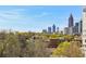 Stunning skyline view with lush greenery and clear blue sky at 1130 Piedmont Ne Ave # 907, Atlanta, GA 30309