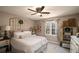 Cozy bedroom with neutral tones, decorative headboard, and plenty of natural light at 1354 Larson Sw Ct, Marietta, GA 30064
