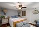 Bedroom with neutral walls, hardwood floors, and plenty of natural light at 1354 Larson Sw Ct, Marietta, GA 30064