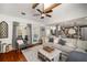 Cozy living room with wood floors, neutral-toned furniture, and a view of the backyard at 1354 Larson Sw Ct, Marietta, GA 30064