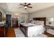 Spacious main bedroom with hardwood floors, ample closet space, and natural light streaming through the windows at 1354 Larson Sw Ct, Marietta, GA 30064