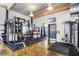 Home gym featuring modern equipment including weight rack, bench, and cable machine at 1661 La France Ne St # 102, Atlanta, GA 30307