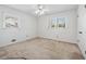 A well-lit bedroom with windows, closet and carpeted floors provides a comfortable living space at 5836 Trailwoods Ct, Stone Mountain, GA 30087
