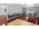 Spacious basement with hardwood floors and ample lighting, perfect for a variety of uses at 612 Kristen Ct, Mcdonough, GA 30252