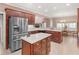 Spacious kitchen featuring stainless steel appliances, granite countertops, and ample cabinet space at 612 Kristen Ct, Mcdonough, GA 30252