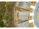 Aerial view of home showcasing lush surrounding greenery in a well-kept neighborhood at 133 Prominence Ct, Canton, GA 30114
