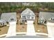 Charming home with manicured front lawn, and an attached two-car garage, in a lovely neighborhood at 133 Prominence Ct, Canton, GA 30114