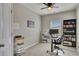 Bedroom featuring a workspace with desk, shelves, and bookcase with lots of natural light at 133 Prominence Ct, Canton, GA 30114