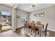 Inviting dining room features an abundance of natural light and ample space for seating at 133 Prominence Ct, Canton, GA 30114