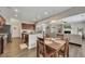 Open floor plan combining the kitchen, dining, and living areas with modern finishes at 133 Prominence Ct, Canton, GA 30114