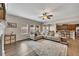 Bright living area featuring an open floor plan connecting the kitchen, living, and dining areas at 133 Prominence Ct, Canton, GA 30114