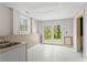 The basement features a tile floor and French doors leading to the outside at 2840 Ivy Mill Dr, Buford, GA 30519