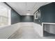 Spacious basement showcasing bead board, and natural light from windows at 2840 Ivy Mill Dr, Buford, GA 30519