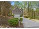 Charming two-story home with a well-manicured lawn, mature trees, and an attached two-car garage at 2840 Ivy Mill Dr, Buford, GA 30519