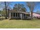 Backyard view with a small wood porch at 910 Brandon Hill Way, Jonesboro, GA 30238