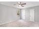 Bright bedroom features carpet floors, and lots of room for furniture and relaxation at 910 Brandon Hill Way, Jonesboro, GA 30238
