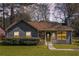 Charming one-story home with stone accents, well-maintained landscaping, and inviting curb appeal at 910 Brandon Hill Way, Jonesboro, GA 30238