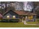 Charming single-story home with stone accents and a well-maintained lawn at 910 Brandon Hill Way, Jonesboro, GA 30238