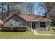 Charming single-story home with a combination of siding and stone, manicured lawn, and a welcoming entrance at 910 Brandon Hill Way, Jonesboro, GA 30238