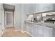 Convenient kitchen view, with stainless steel appliances, granite countertops and ample cabinet space at 910 Brandon Hill Way, Jonesboro, GA 30238