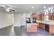 Open-concept kitchen with a center island, granite countertops, and stainless steel appliances at 2205 Capella Sw Cir, Atlanta, GA 30331